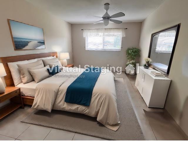 tiled bedroom featuring ceiling fan