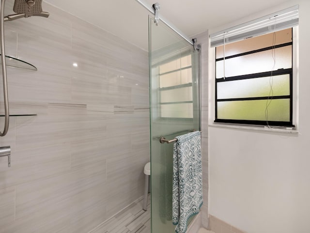 bathroom with walk in shower