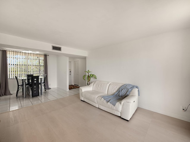 living room featuring light tile patterned floors