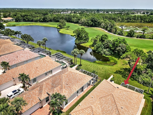 drone / aerial view with a water view