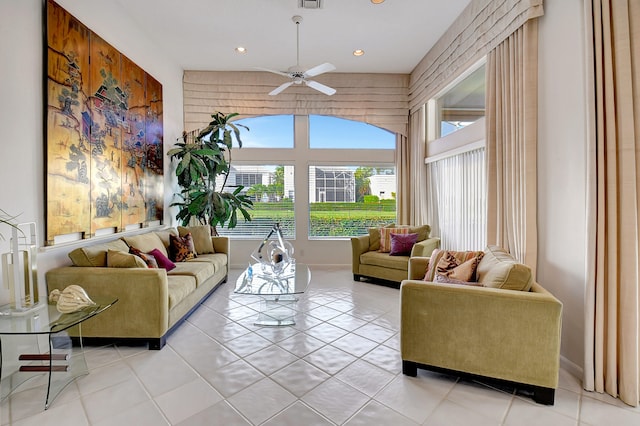 tiled living room featuring ceiling fan