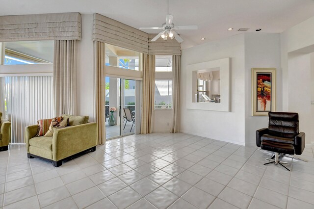 living area featuring recessed lighting, visible vents, a ceiling fan, and light tile patterned flooring