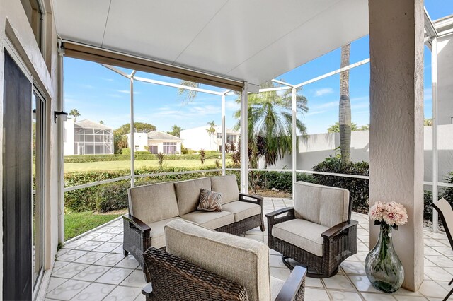 sunroom featuring a residential view