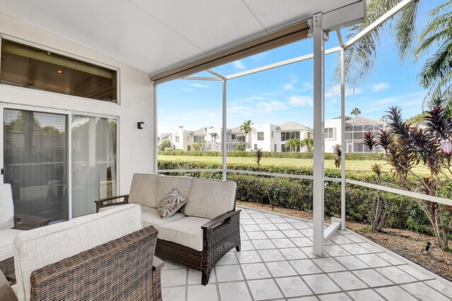 sunroom / solarium with a residential view