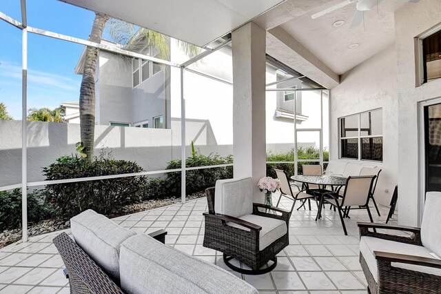 view of patio with ceiling fan and an outdoor living space