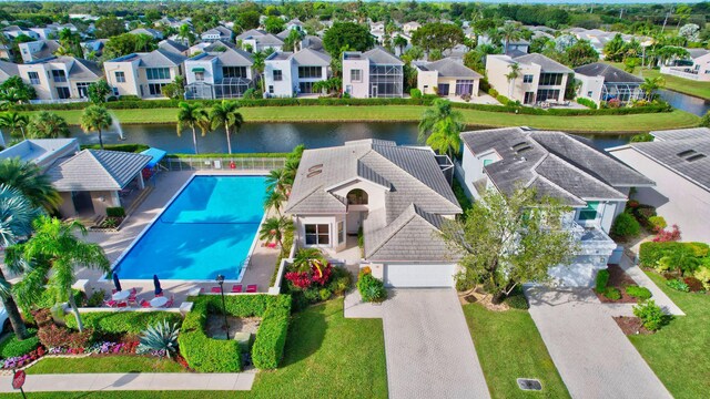 aerial view with a residential view and a water view