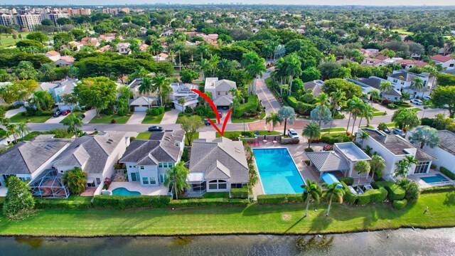 aerial view featuring a water view and a residential view