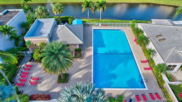 view of pool with a water view