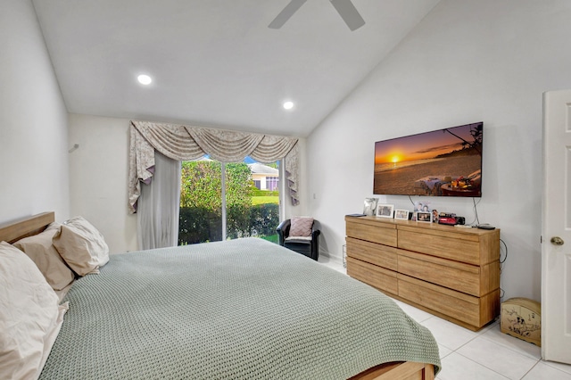 tiled bedroom with ceiling fan and lofted ceiling