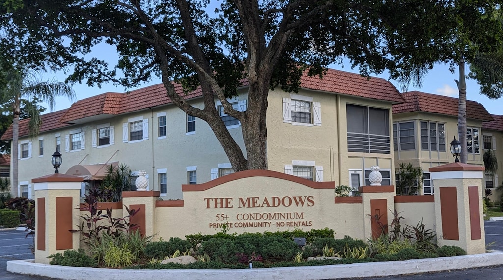 view of community sign