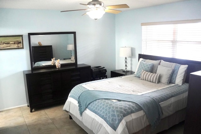 bedroom featuring ceiling fan and light tile patterned floors