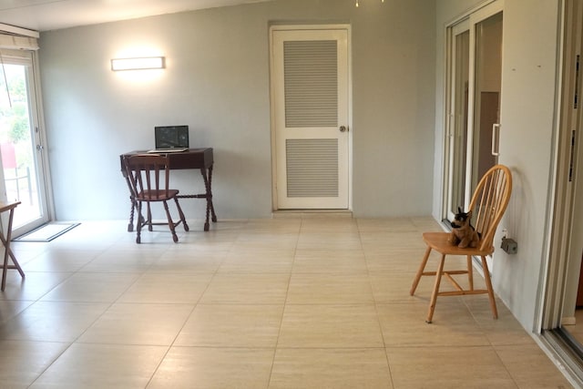 corridor featuring tile patterned floors