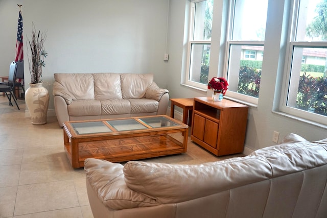 living room featuring light tile patterned flooring