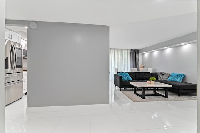 living room with light tile patterned floors