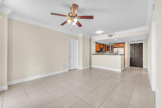 unfurnished living room featuring ornamental molding, light tile patterned flooring, visible vents, and baseboards