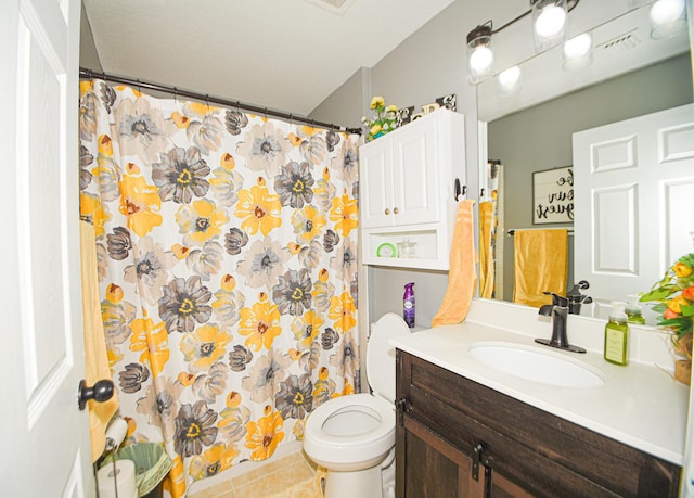 full bathroom with toilet, visible vents, vanity, and tile patterned floors