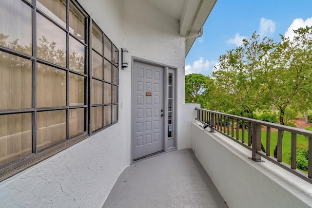 property entrance with a balcony