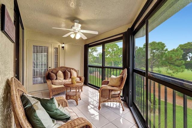 sunroom / solarium with ceiling fan