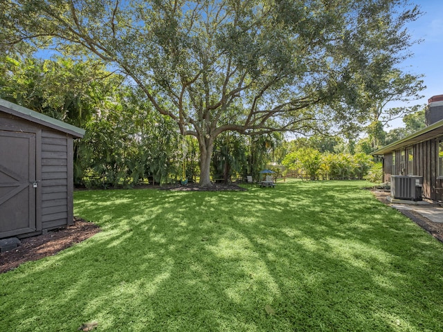 view of yard featuring central AC