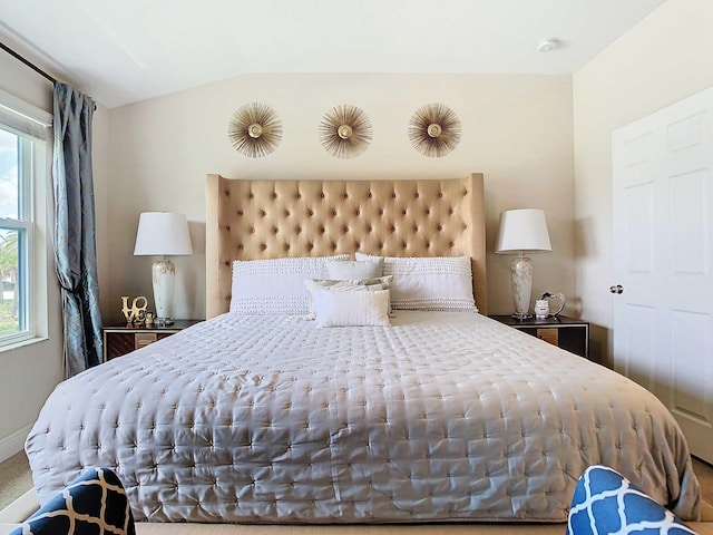 bedroom with vaulted ceiling