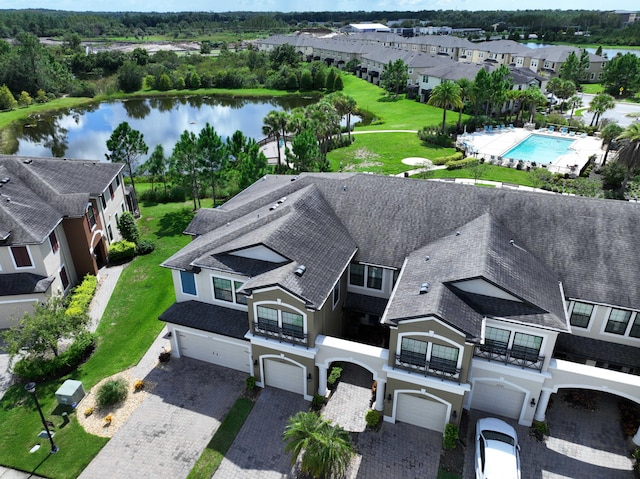 drone / aerial view with a water view