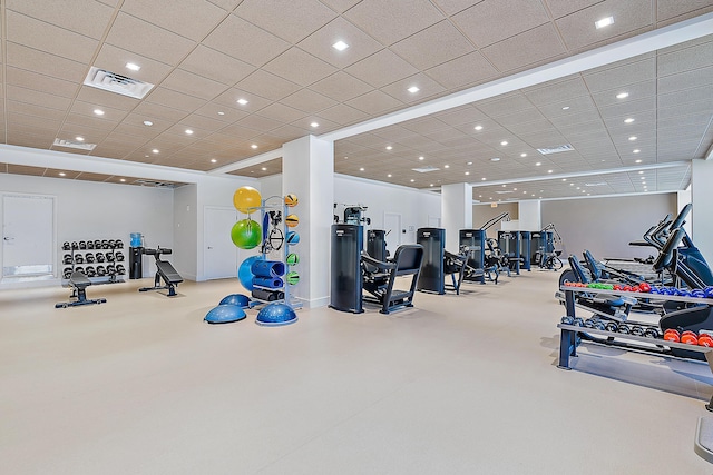 exercise room with a drop ceiling