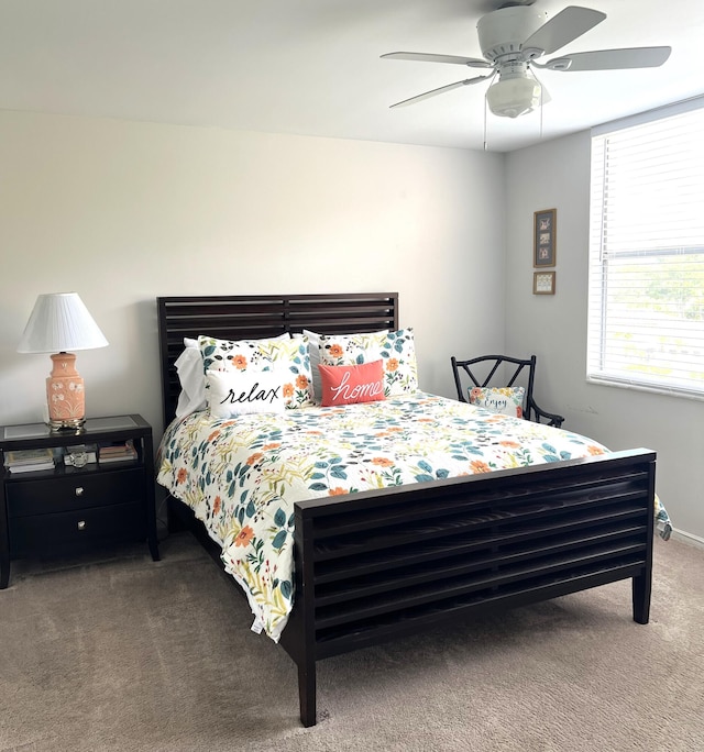 bedroom featuring carpet and ceiling fan