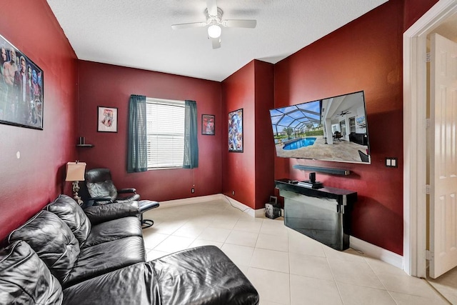 tiled living room featuring ceiling fan