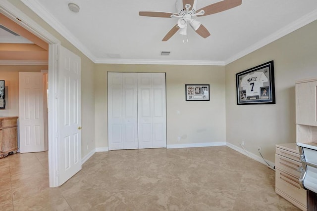 unfurnished bedroom with ornamental molding, light tile patterned floors, a closet, and ceiling fan