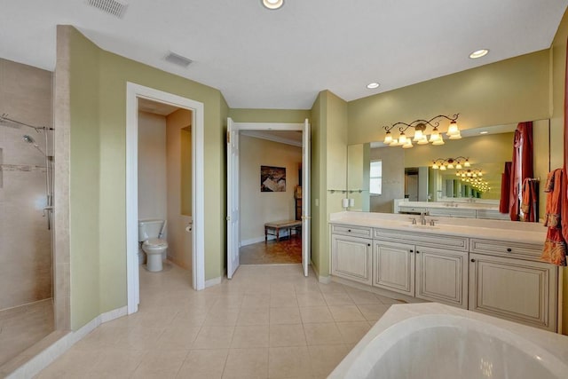 full bathroom with toilet, tile patterned floors, vanity, and independent shower and bath