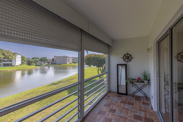 sunroom with a water view