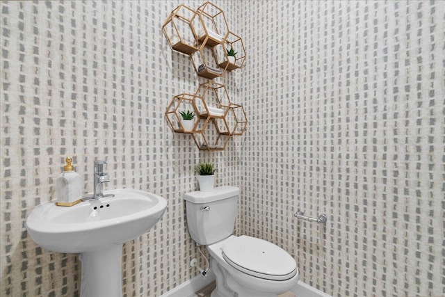 bathroom featuring toilet