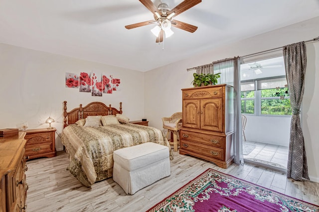 bedroom with ceiling fan and light hardwood / wood-style floors