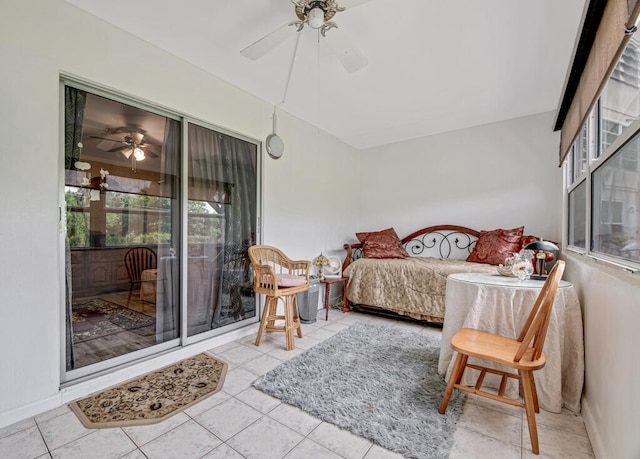 tiled bedroom with ceiling fan