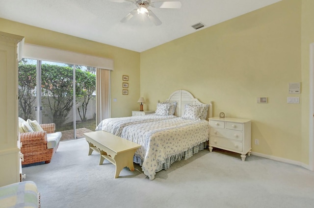 bedroom featuring ceiling fan, light colored carpet, and access to outside