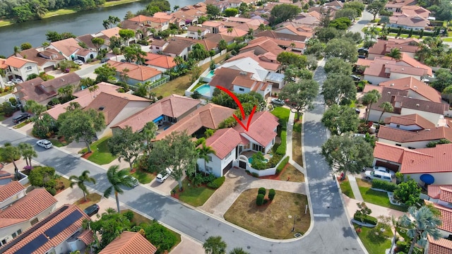 bird's eye view with a water view