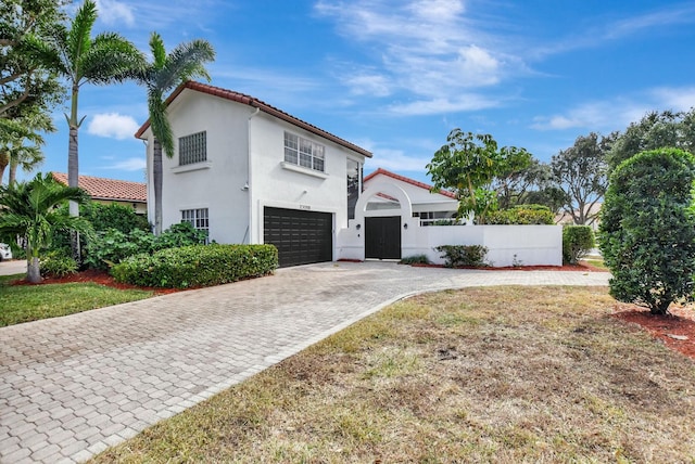 view of side of property with a garage