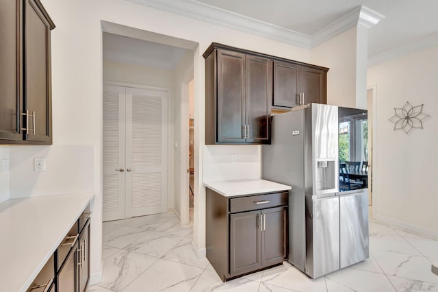 kitchen with crown molding, light tile patterned flooring, stainless steel refrigerator with ice dispenser, and dark brown cabinets