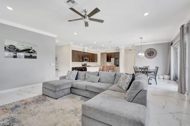 living room with ceiling fan, ornamental molding, and light tile patterned floors