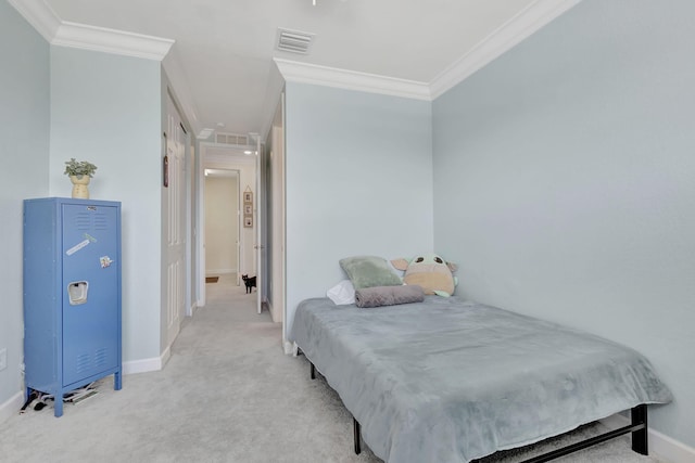 carpeted bedroom featuring ornamental molding