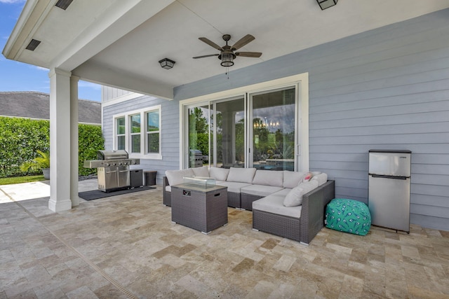 view of patio / terrace with ceiling fan, an outdoor hangout area, and area for grilling