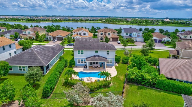 bird's eye view with a water view