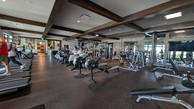 exercise room featuring coffered ceiling