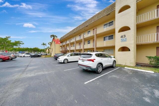 view of parking / parking lot