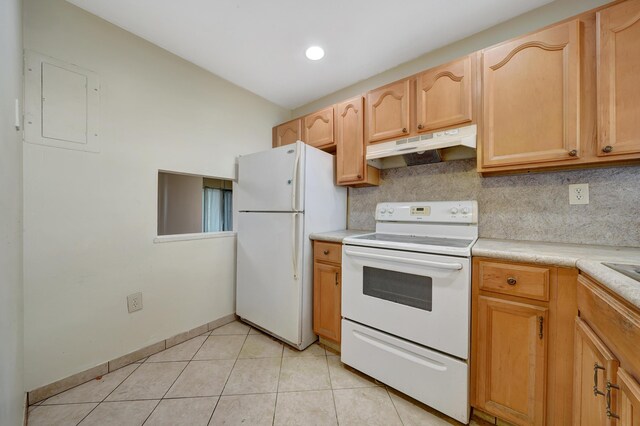 kitchen featuring backsplash, light brown cabinets, white appliances, and light tile patterned floors