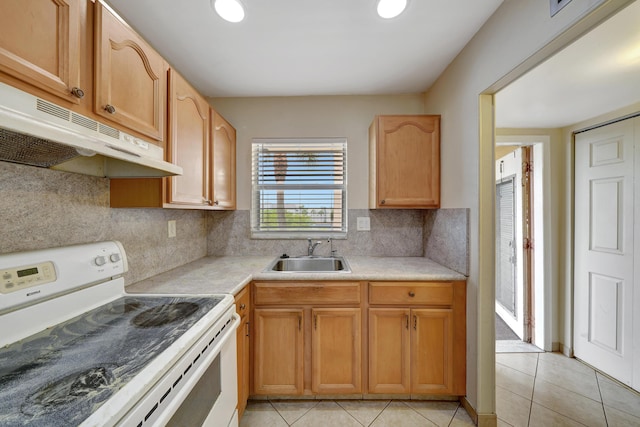 kitchen featuring electric stove, sink, decorative backsplash, and light tile patterned floors