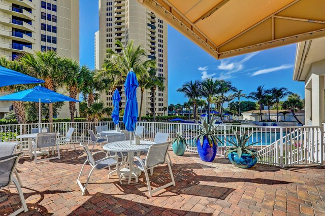 view of patio / terrace with a community pool