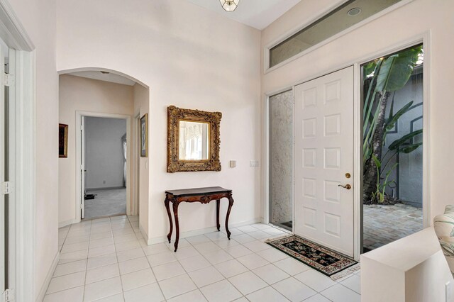 entrance foyer with light tile patterned floors