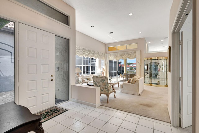 entrance foyer with light tile patterned floors