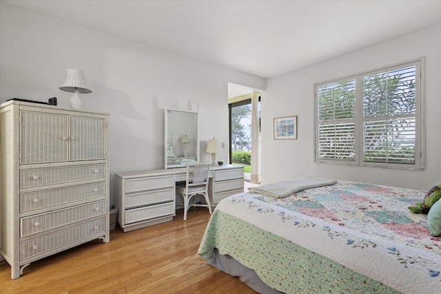 bedroom with light hardwood / wood-style floors